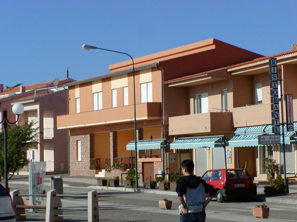 Borgo Spiaggia Vista Mare Isola Rossa Værelse billede