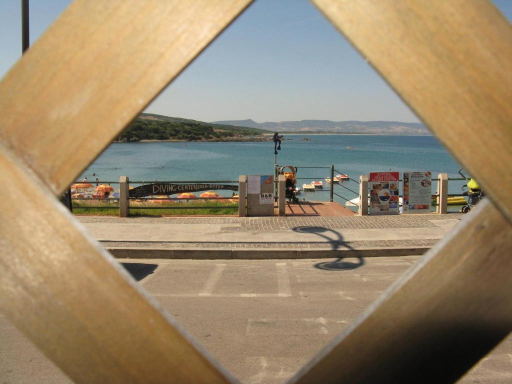 Borgo Spiaggia Vista Mare Isola Rossa Værelse billede